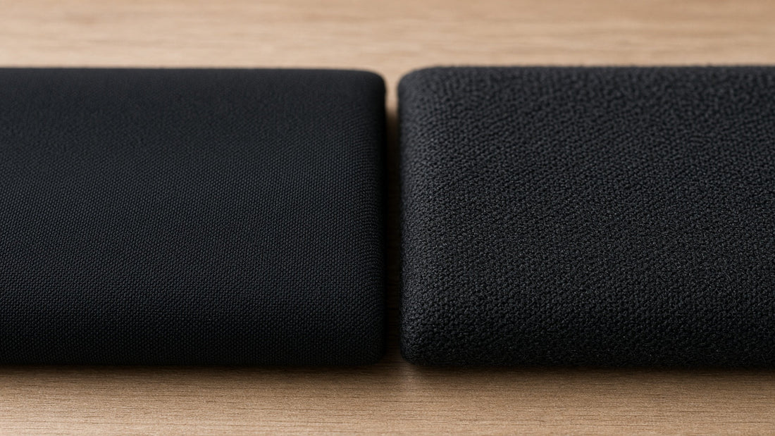 Two folded Oakman fabric swatches side by side, contrasting weave textures.